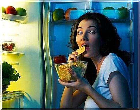 Woman eating unhealthy snacks