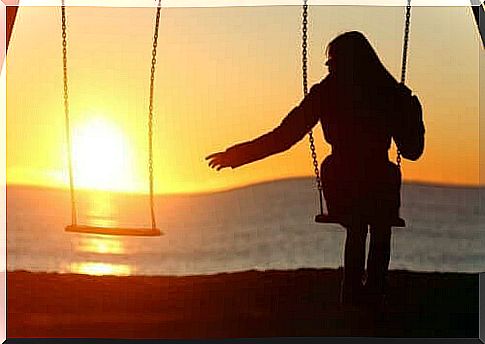 A woman on a swing.