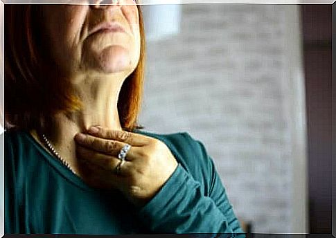 A woman with laryngitis.