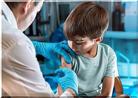 A child receiving a vaccine.