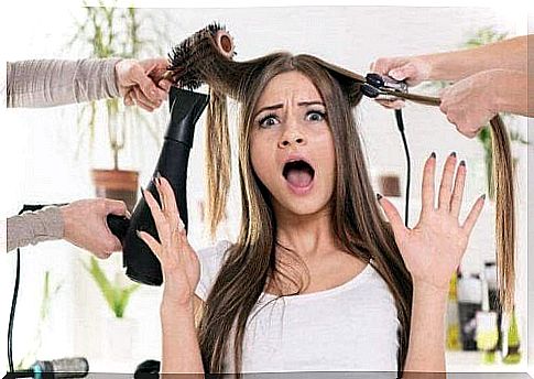 A stressed lady at the hairdresser.