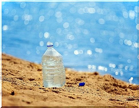 Plastic bottle in the sand