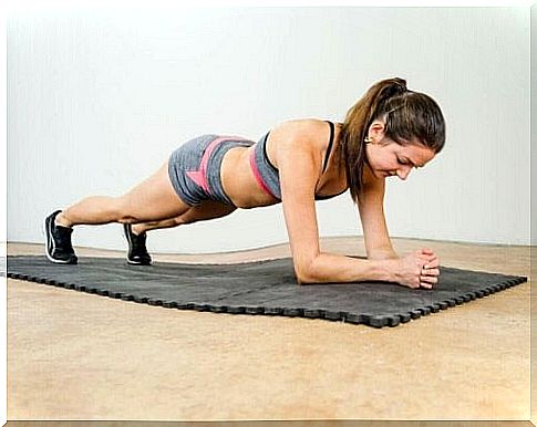 A woman making the plank